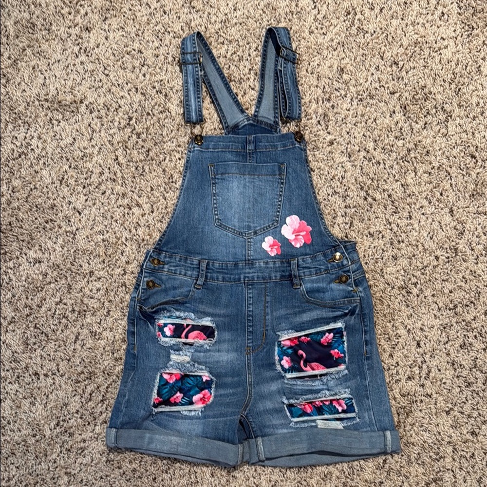 Size medium denim overalls distressed with flowers and flamingos